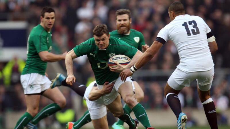 Ireland’s Brian O’Driscoll  is tackled during the Six Nations clash with England at Twickenham. Photograph:  Kieran Galvin/EPA