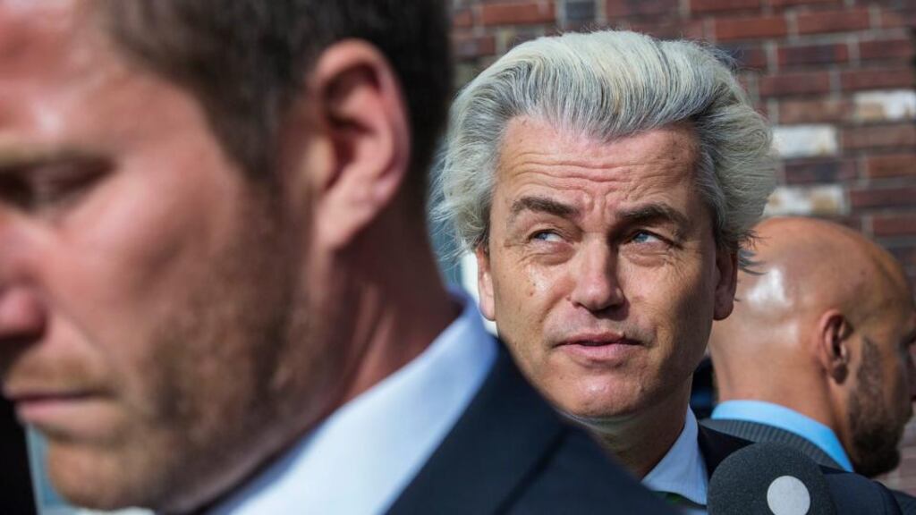 Geert Wilders of the anti-immigration Dutch Freedom Party, flanked by bodyguards, after he cast his vote for the European Parliament elections. Photograph: Michael Kooren/Reuters