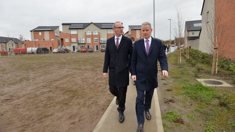 2017: Simon Coveney with Andrew McDowell, who has been selected as one of the candidates to replace Phil Hogan at the European Commission. Photograph: Alan Betson / The Irish Times