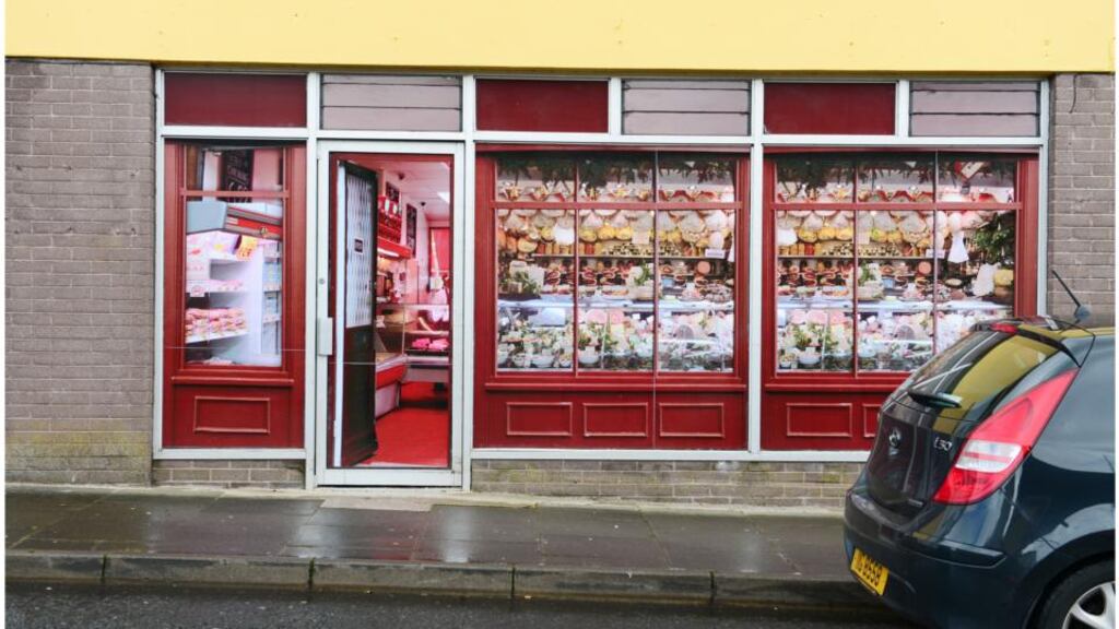 A “pretend” butcher’s  shop in the village of Belcoo, Co Fermanagh. Some vacant stores and shops in the village have large wraparound stickers placed on the windows to give the impression from a distance of an occupied business. The G8 summit will take place in nearby Lough Erne resort. Photograph: Bryan O’Brien