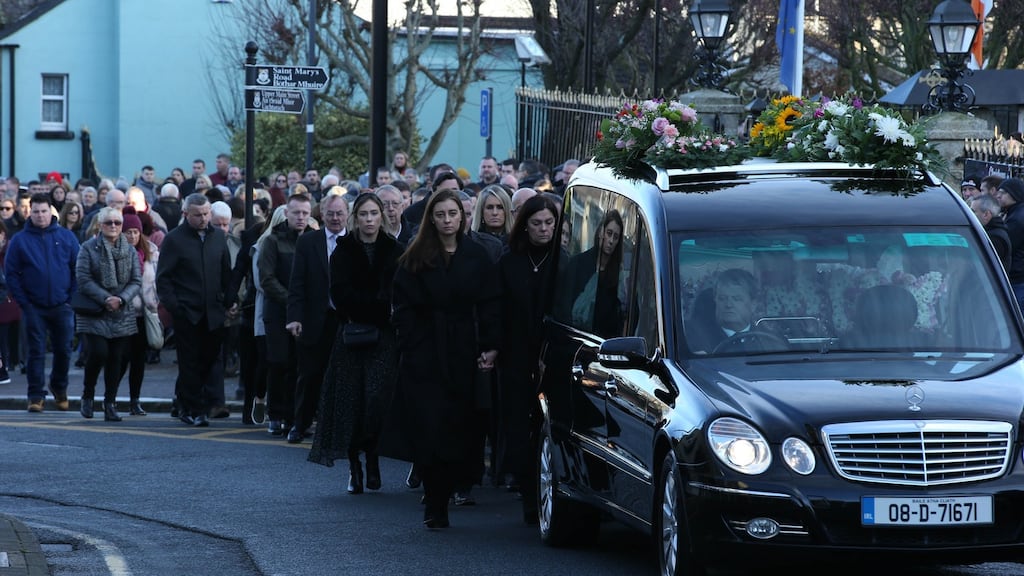The funeral cortege of Nadine Lott passes through the streets of Arklow on Sunday. Photograph: Stephen Collins/Collins