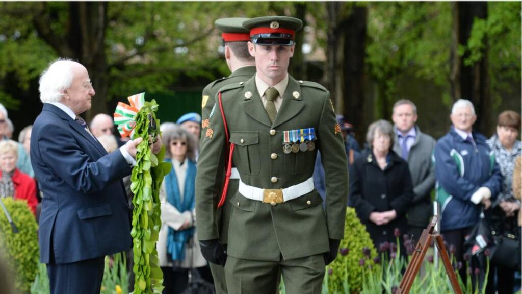 President Michael D Higgins prepares to lay a wreath at the annual 1916 commemoration.