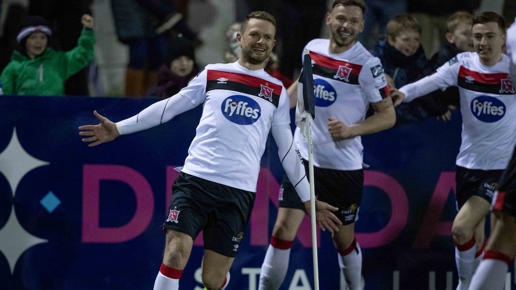 Dane Massey celebrates scoring the winning goal in the SSE Airtricity League Premier Division game against Derry City at Oriel Park. Photograph: Morgan Treacy/Inpho
