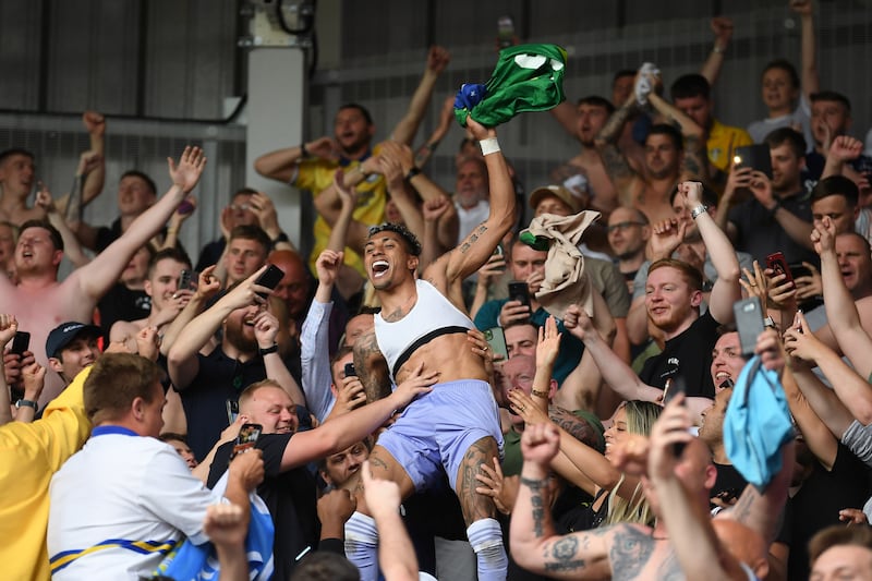 Raphinha celebrates with Leeds United fans after avoiding relegation in May 2022. Photograph: Alex Davidson/Getty Images