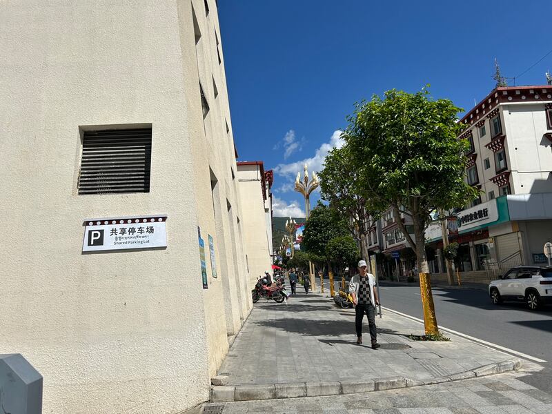 A street sign in Xiangcheng, western Sichuan, in Tibetan, Chinese and English. Photograph: Denis Staunton