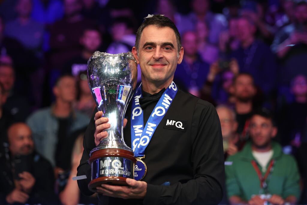 Ronnie O'Sullivan of England poses for a photo with the MrQ UK Snooker Championship 2023 trophy. Photograph: George Wood/Getty