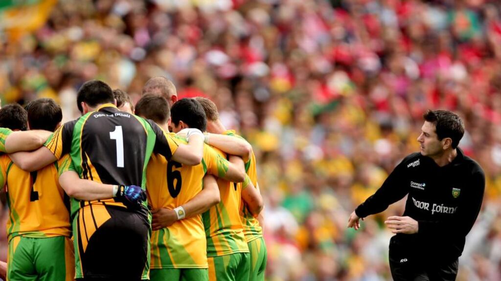 New Donegal manager Rory Gallagher was formerly a selector under Jim McGuinness. Here he departs a team huddle prior to the start of the All-Ireland semi-final in 2012. Photograph: James Crombie/Inpho
