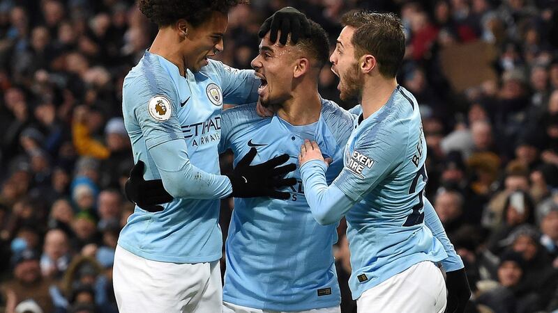 Manchester City’s Gabriel Jesus, centre, celebrates scoring a goal with Leroy Sané and Bernardo Silva. Photograph: Paul Ellis/AFP/Getty Images