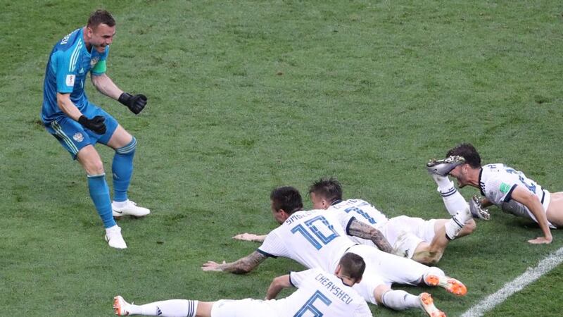 Russia’s Igor Akinfeev celebrates with his teammates after they beat Spain on penalties in the last 16 of the 2018 World Cup. Photo: Abedin Taherkenareh/EPA