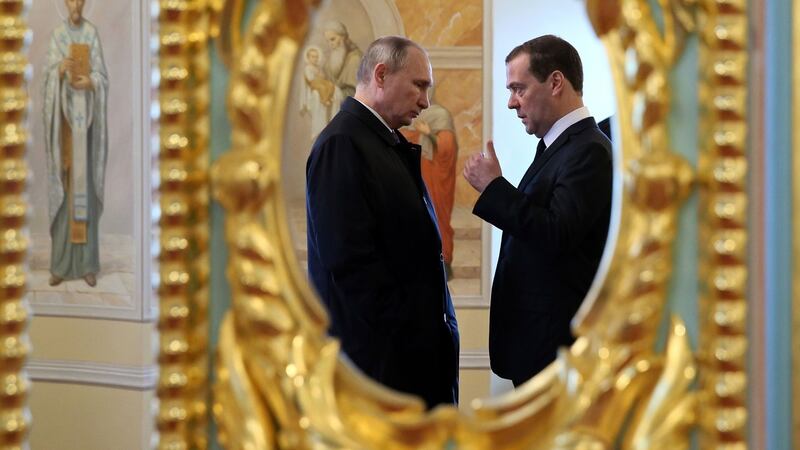 Putin, left, with prime minister Dmitry Medvedev while visiting the New Jerusalem Resurrection Monastery , east of Moscow, in 2017. File photograph: Yekaterina Shtukina/Sputnik/Government Pool Photo via AP