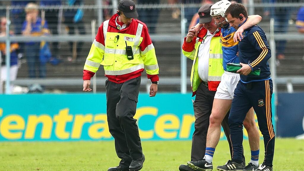 Tipperary’s Brendan Maher leaves the field injured during their Munster SHC loss to Clare. Photo: James Crombie/Inpho