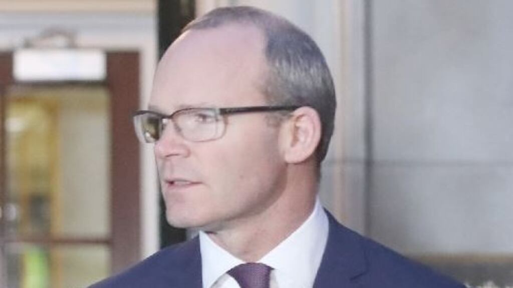 The Tánaiste Simon Coveney  expressed the hope that the talks could be brought around again and  said there were positives in the statement of DUP leader Arlene Foster. File photograph: Niall Carson/PA