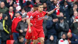 Liverpool strike late to sink 10-men QPR