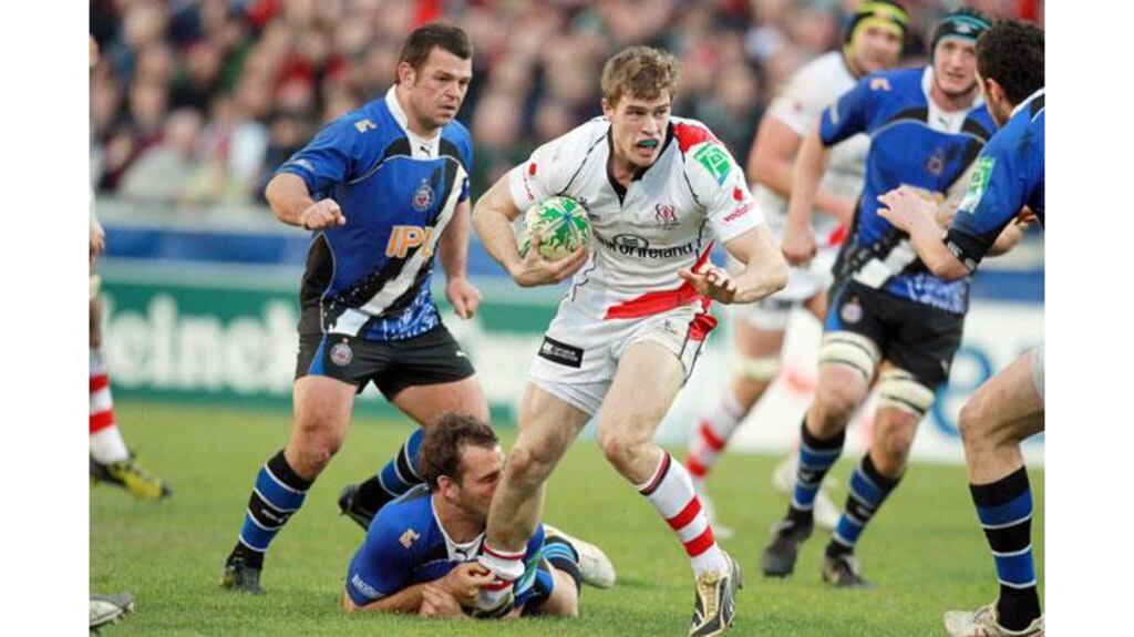 Ulster's Andrew Trimble is tackled by Bath's Olly Barkley during their Heineken Cup encounter at Ravenhill in November. (Photograph: Darren Kidd/Inpho/Presseye)