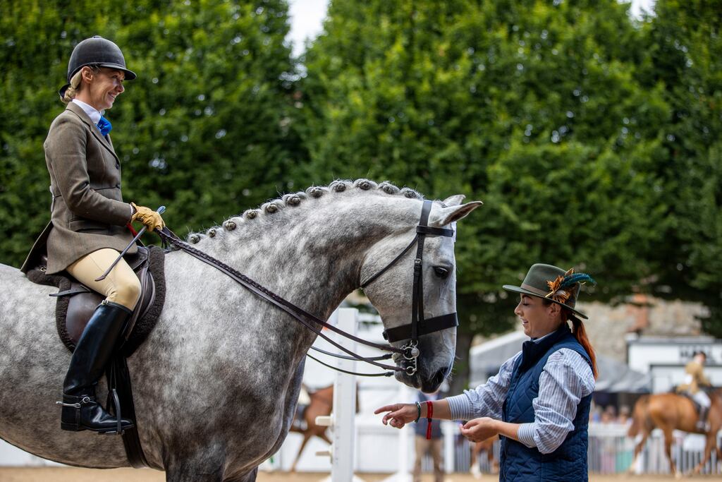 Rider RoseMarie Ahern O’Gorman from Bandon, West Cork on Bouncer, with owner Nicola Chambers from Kinsale, at the RDS Horse Show. Photograph: Tom Honan for The Irish Times.