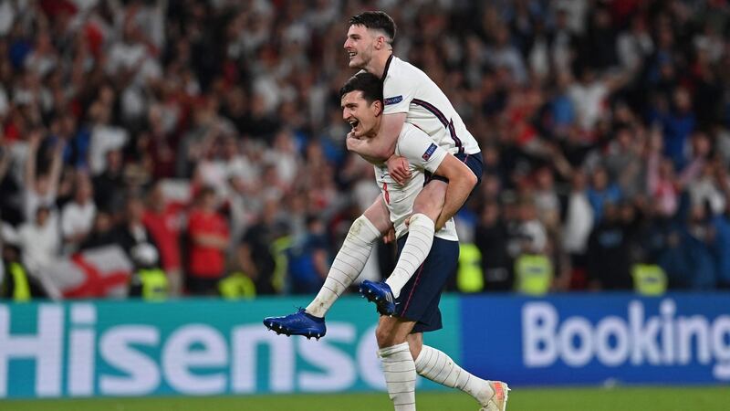 Harry Maguire and Declan Rice celebrate England’s win over Denmark. Photograph: Paul Ellis/Getty/AFP