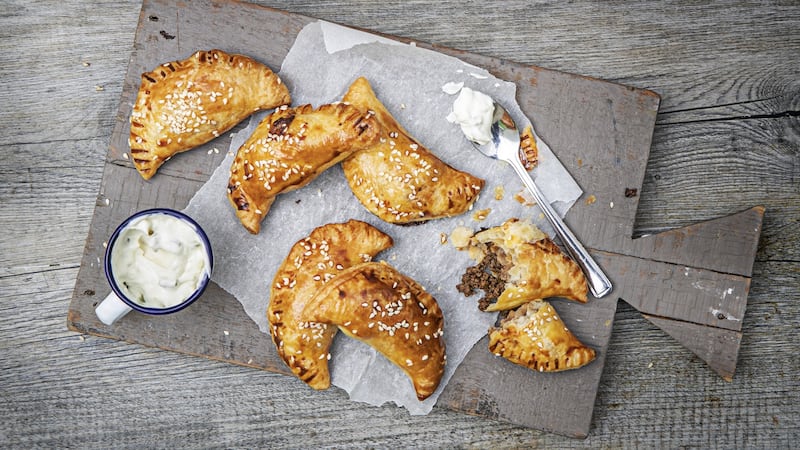 Bolognese empanadas, jalapeno créme fraiche. Photograph: Harry Weir Photography
