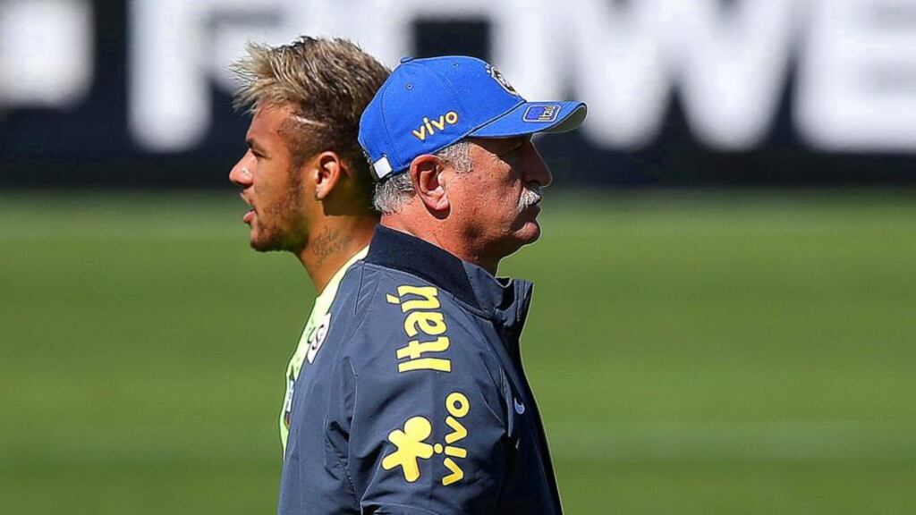 Brazilian striker Neymar (L) and head coach Luiz Felipe Scolari.