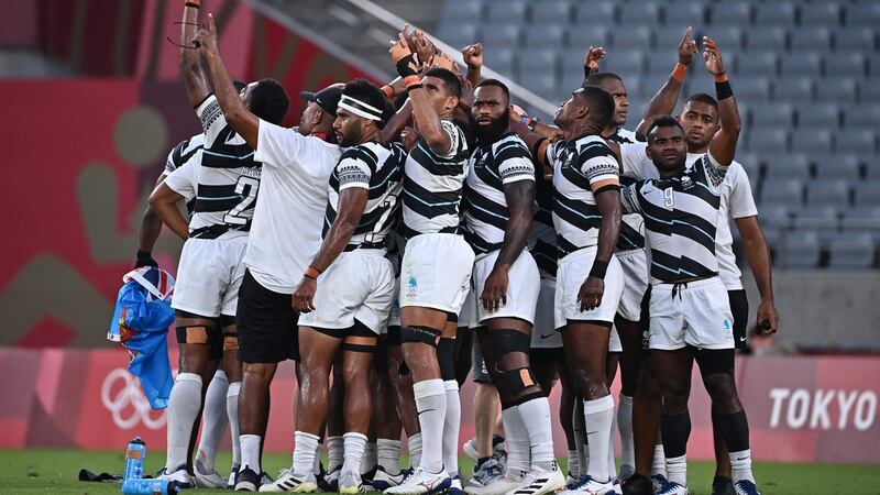 Fiji celebrate after their gold medal win over New Zealand. Photograph: Ben Stansall/Getty/AFP