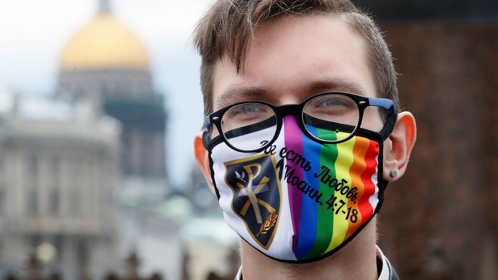 A supporter of LGBT rights takes part in an opposition protest in St Petersburg, Russia, on Wednesday. Photograph: Anatoly Maltsev/EPA