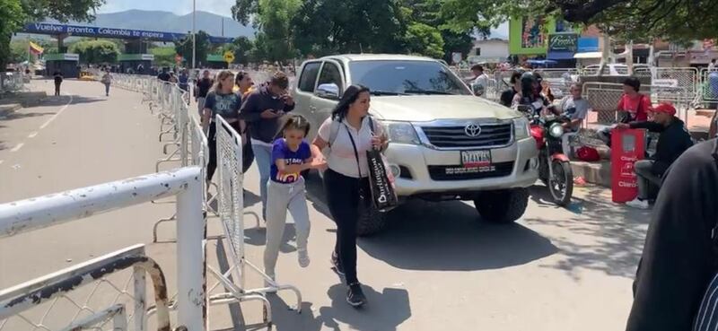 People leaving Venezuela at the San Antonio crossing, just outside Cúcuta, and arriving in Columbia. Photograph: Peter Murtagh