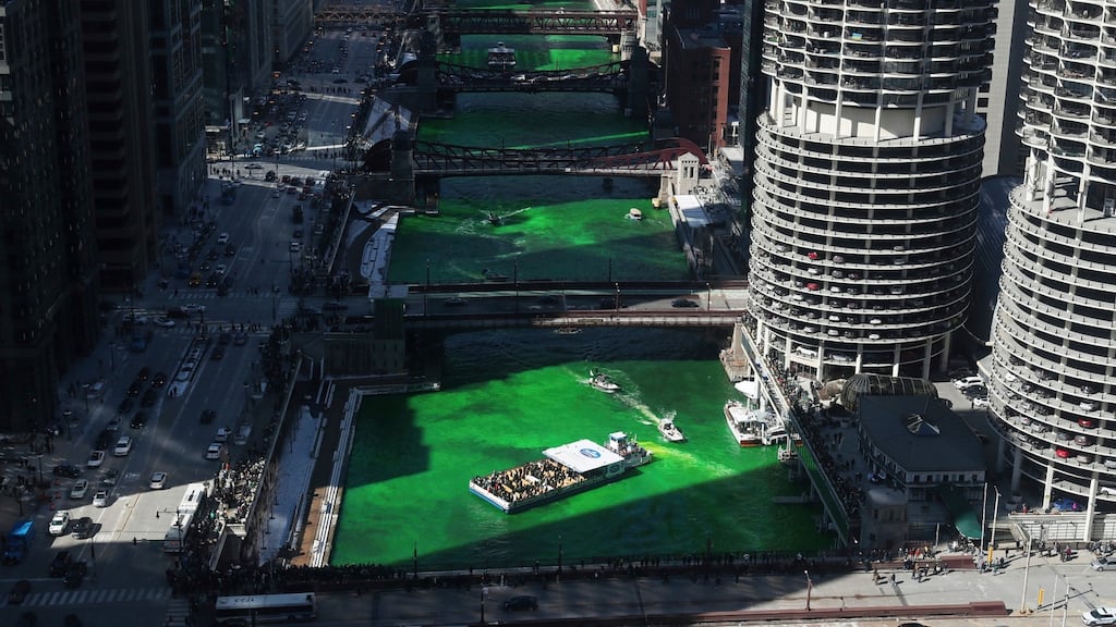 The Chicago river, dyed green for St Patrick’s Day: Some 75 per cent of  respondents to a UCD Clinton Institute survey said their sense of Irishness is enriched by film and television and by festivals.  Photograph: John J Kim/Chicago Tribune/AP