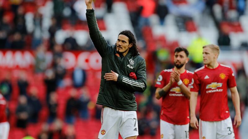 Edinson Cavani waves to the Old Trafford crowd after Manchester United’s draw with Fulham. Photograph: Phil Noble/EPA