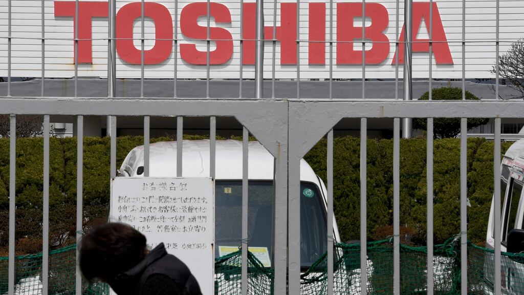 Toshiba signed an $18 billion deal to sell its chip unit to a consortium led by Bain Capital LP. Photograph: Toshifumi Kitamura/AFP/Getty
