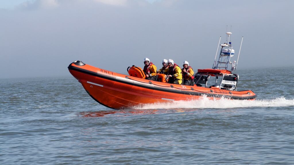 Members of Youghal RNLI boarded the fishing boat with a salvage pump and quickly began to pump the water overboard. Photograph: Youghal RNLI