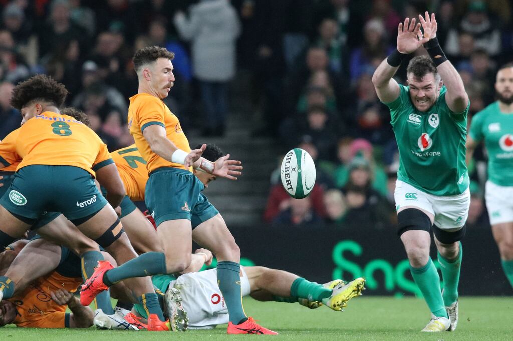 Australia's scrum-half Nic White (L) kicks the ball during the Autumn Nations Series international rugby union match between Ireland and Australia at the Aviva Stadium in Dublin, on Saturday. Photograph: Paul Faith/ AFP/ Getty Images