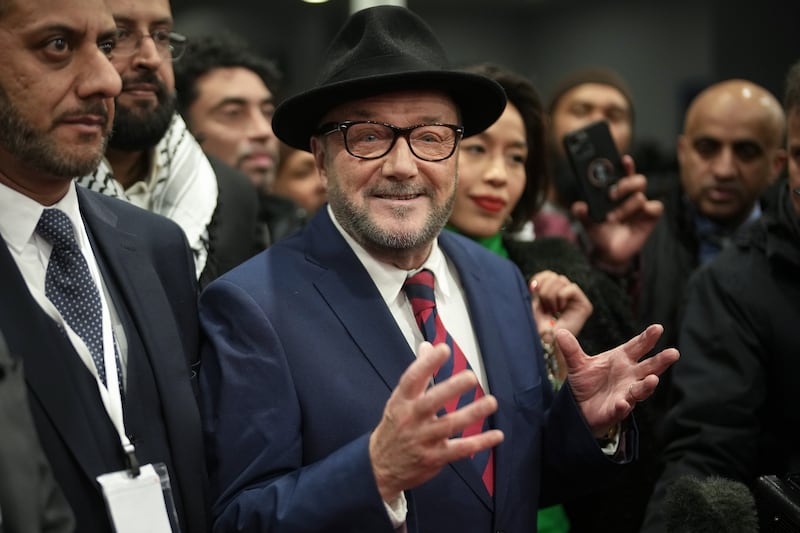 George Calloway celebrates with supporters at his campaign headquarters after being declared the winner in the Rochdale byelection earlier this year. Photograph: Christopher Furlong/Getty Images