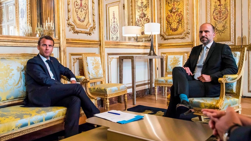 French president Emmanuel Macron (L) meets Uber chief executive Dara Khosrowshahi at the Elysee Palace in Paris Photograph: Getty