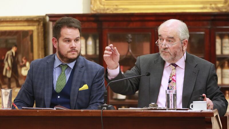 Going, going, gone: George and Fonsie Mealy during the auction. Photograph: Nick Bradshaw