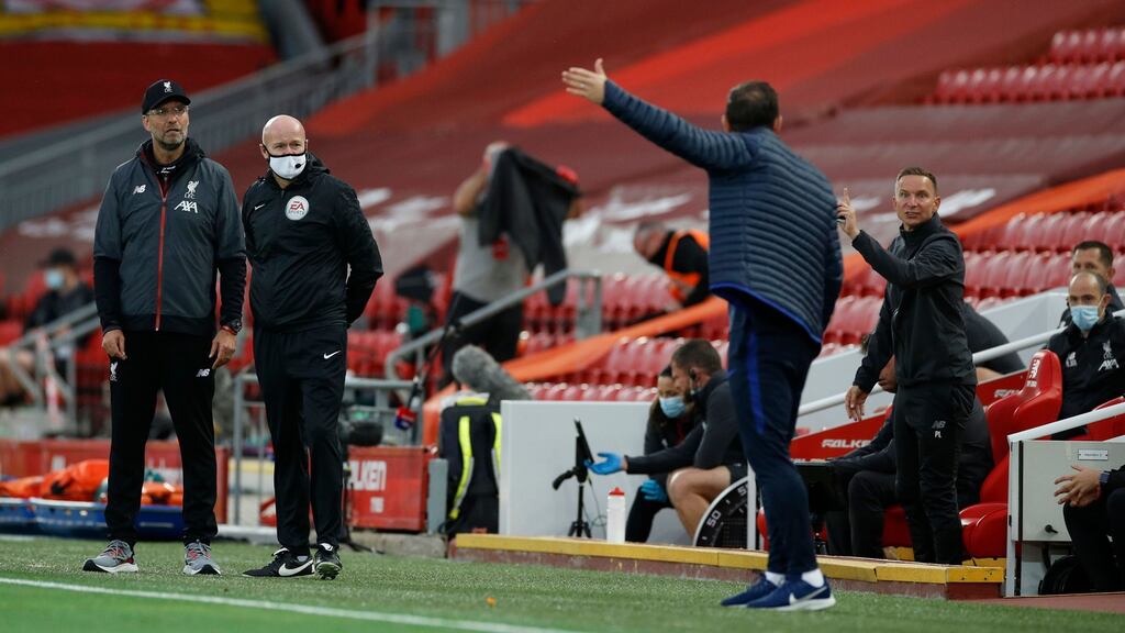 Liverpool manager Jürgen Klopp has a disagreement with Frank Lampard during their Premier League clash in jUly 2020. Photo: Phil Noble/AFP via Getty Images