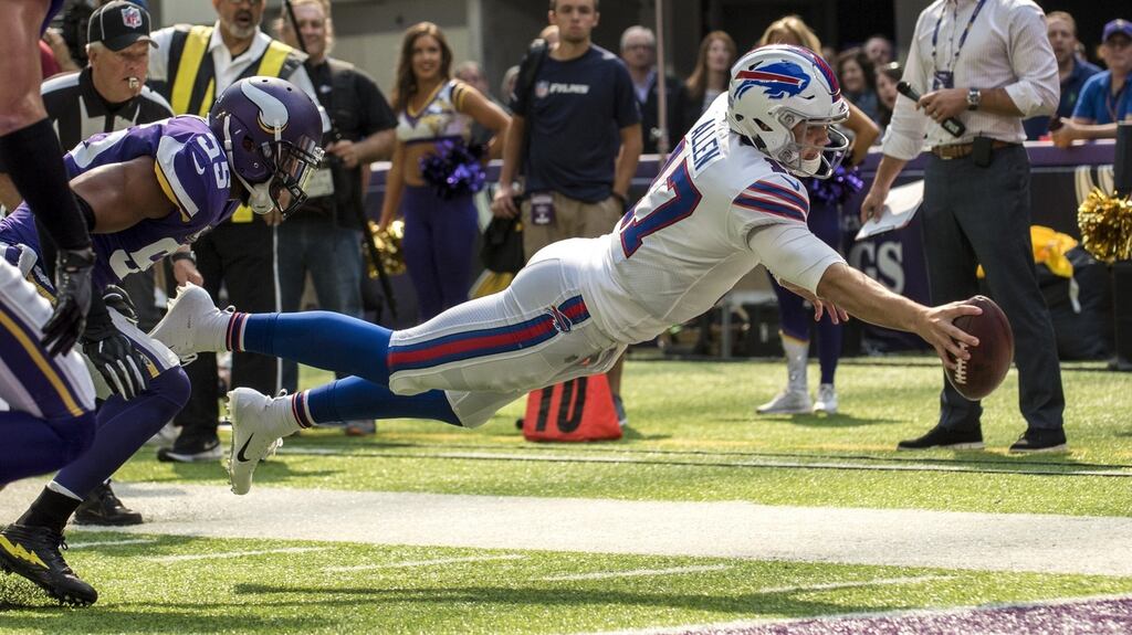 Josh Allen dives to score for the Buffalo Bills in their win over the Minnesota Vikings. Photograph: Stephen Matureen/Getty