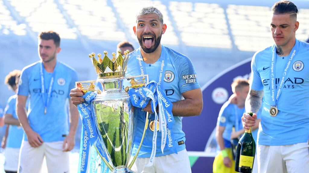Sergio Aguero celebrates Manchester City’s title win at Brighton. Photograph: Michael Regan/Getty