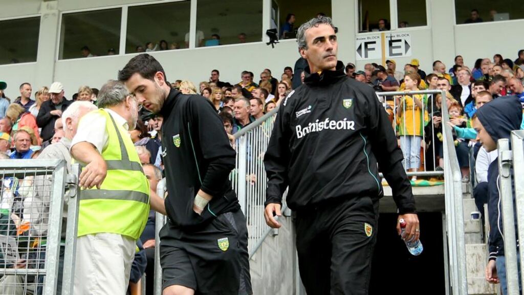 Donegal’s Mark McHugh, who has left the county panel,  and team manager Jim McGuinness. Photograph: James Crombie/Inpho