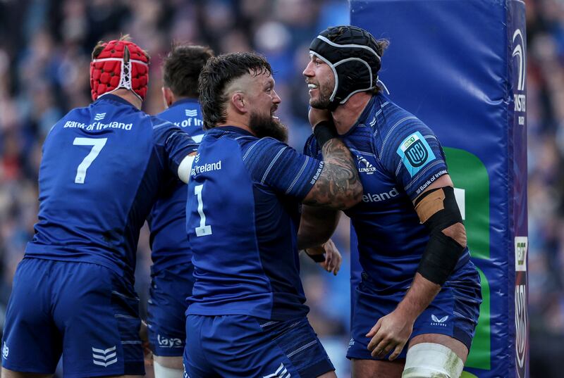 Leinster’s Caelan Doris celebrates scoring a try with Andrew Porter. Photograph: Dan Sheridan/Inpho