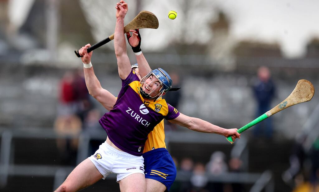 Wexford's Charlie McGuckin and Clare's David Fitzgerald battle for possession during the league clash in Ennis. Clare have been boosted by the news in midweek that Rory Hayes and Peter Duggan are free to line out. Photograph; Ryan Byrne/Inpho