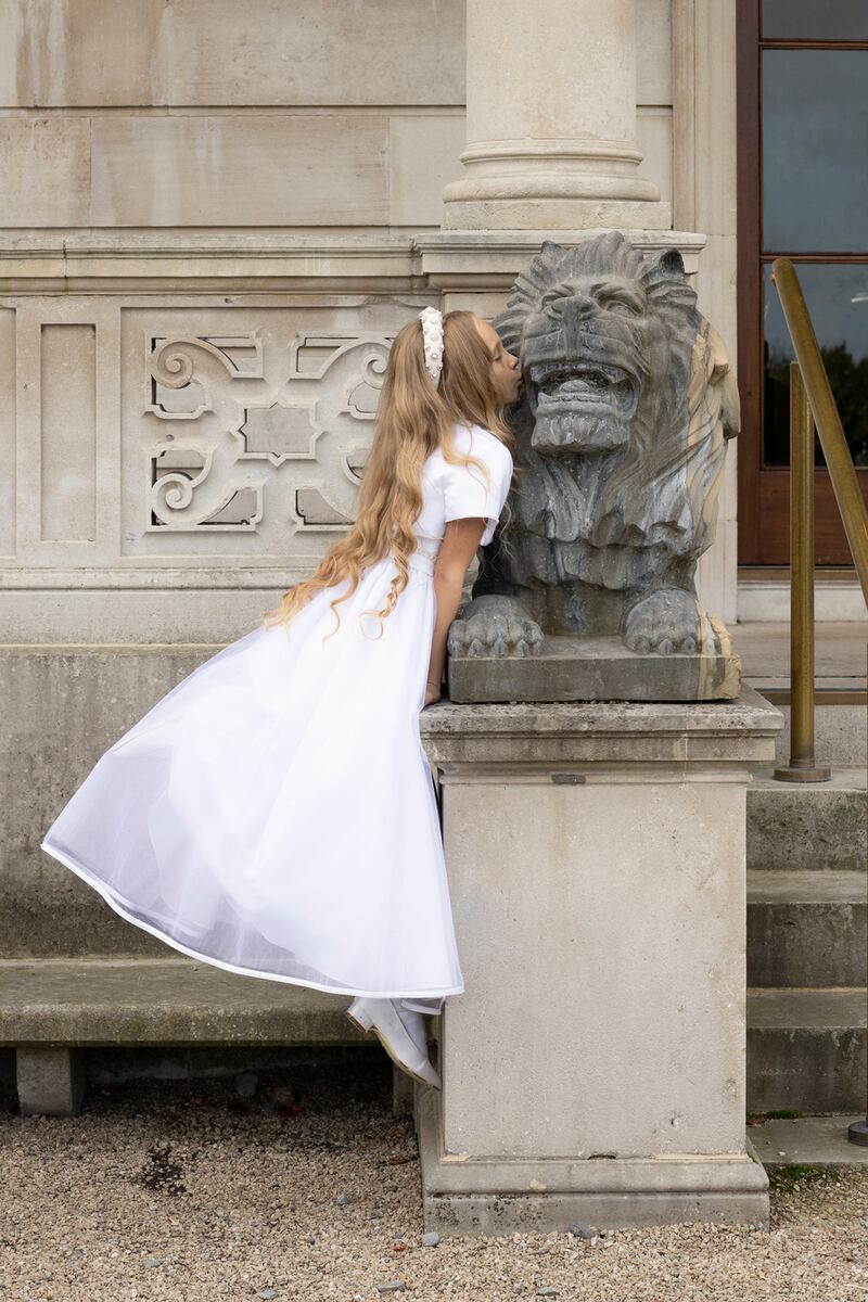 Sophia: Dress, €330, Celebrations; hairband, €84, Alice+Blair; white satin shoes, €45, Rainbow Club