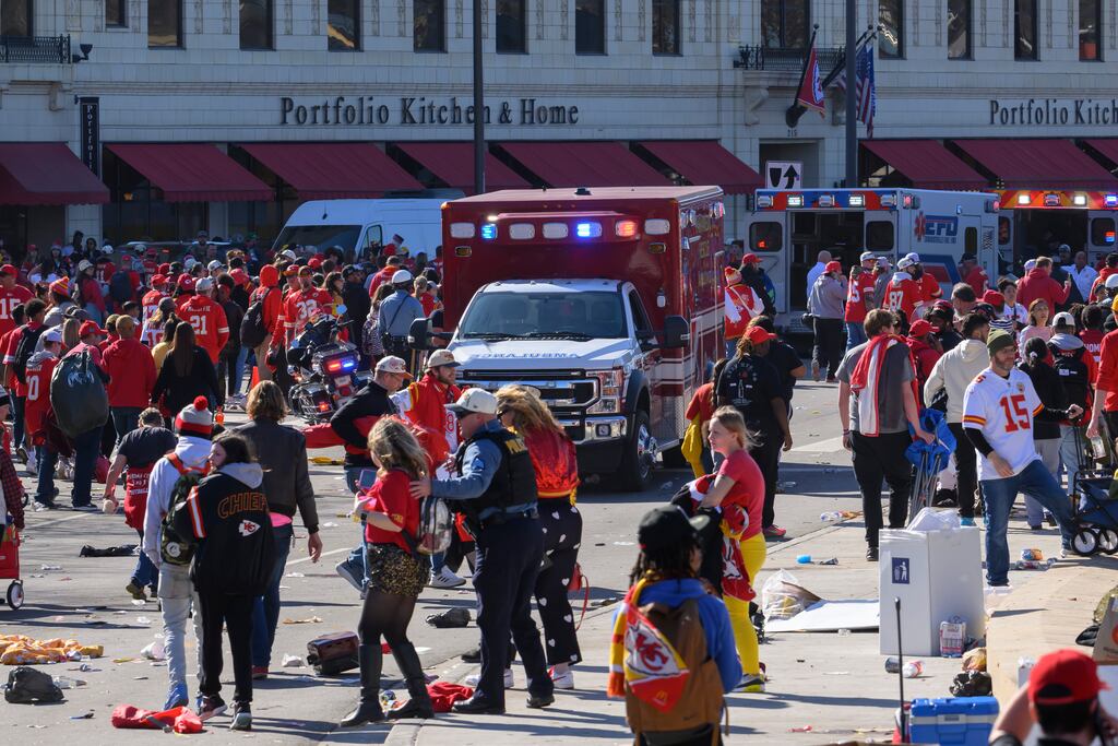 Police clear the area after a shooting at the Kansas City Chiefs Super Bowl celebration. Photograph: Reed Hoffmann/AP