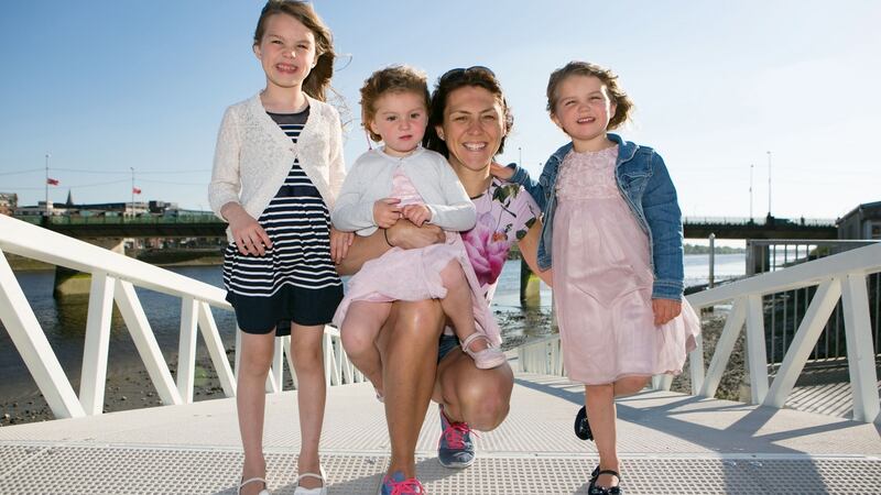 Sinéad Lynch with Hannah, Molly and Clodagh: “They see me going everywhere on the bike, so if they see someone getting into the car for a short journey they question it. They’re learning a healthy way of life.” Photograph: Brian Gavin/Press 22