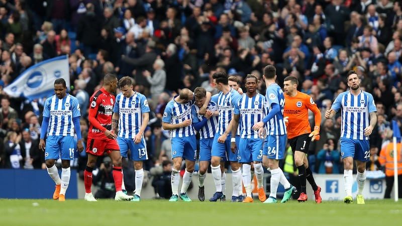 Brighton celebrate ther opener against Crystal Palace. Photograph: Bryn Lennon/Getty
