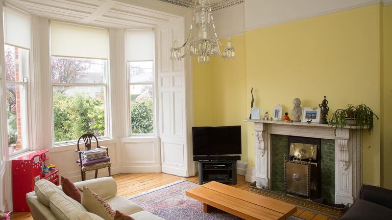 The house includes a good-sized livingroom on the left of the front hall with a deep bay window