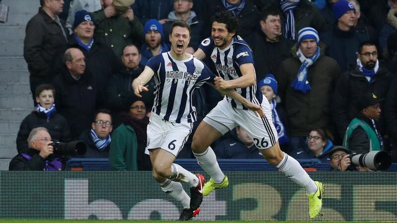 Jonny Evans gives West Brom the lead against Brighton. Photograph: Darren Staples/Reuters