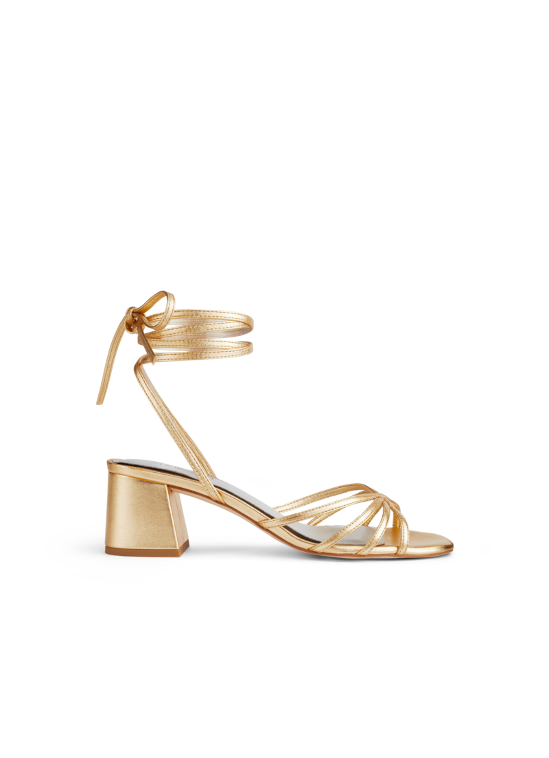 Gold strappy block heels, €345, LK Bennett