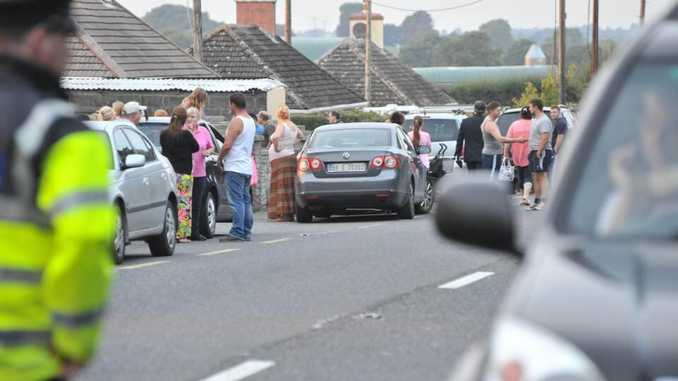 The scene outside the house where two children were found dead in the Charleville area of north county Cork last night. Photograph: Daragh Mc Sweeney/Provision