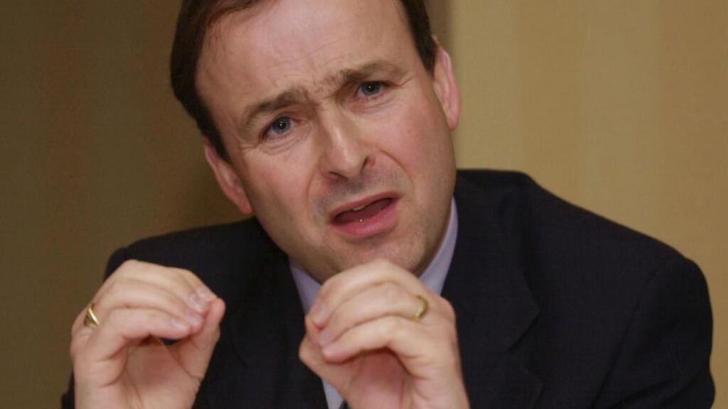 Micheál Martin: said Joan Burton “specialised in a major conjuring trick of both being part of the Government and distancing herself from it”. Photograph: Peter Thursfield