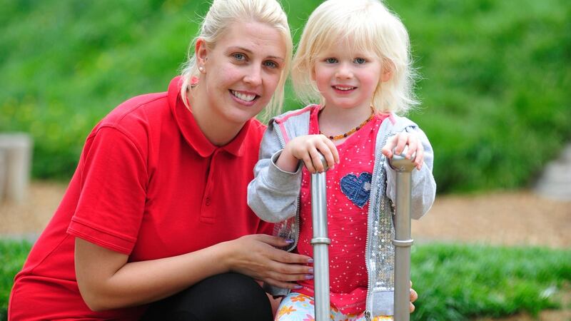 Lisa Cronin from Crumlin Childcare Centre  with Abbie Jordan in Pearce Park, in Crumlin. Photograph: Aidan Crawley