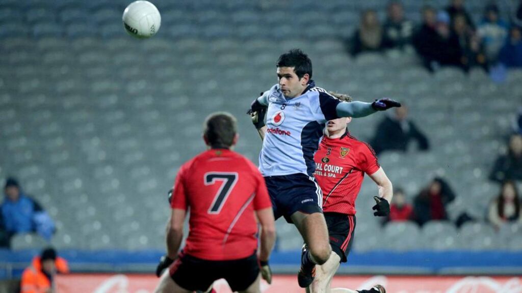 Dublin's Cian O'Sullivan unleashes a volley towards the Down net during the Allianz Football League Division One game at Croke Park. Photograph: Morgan Treacy/Inpho